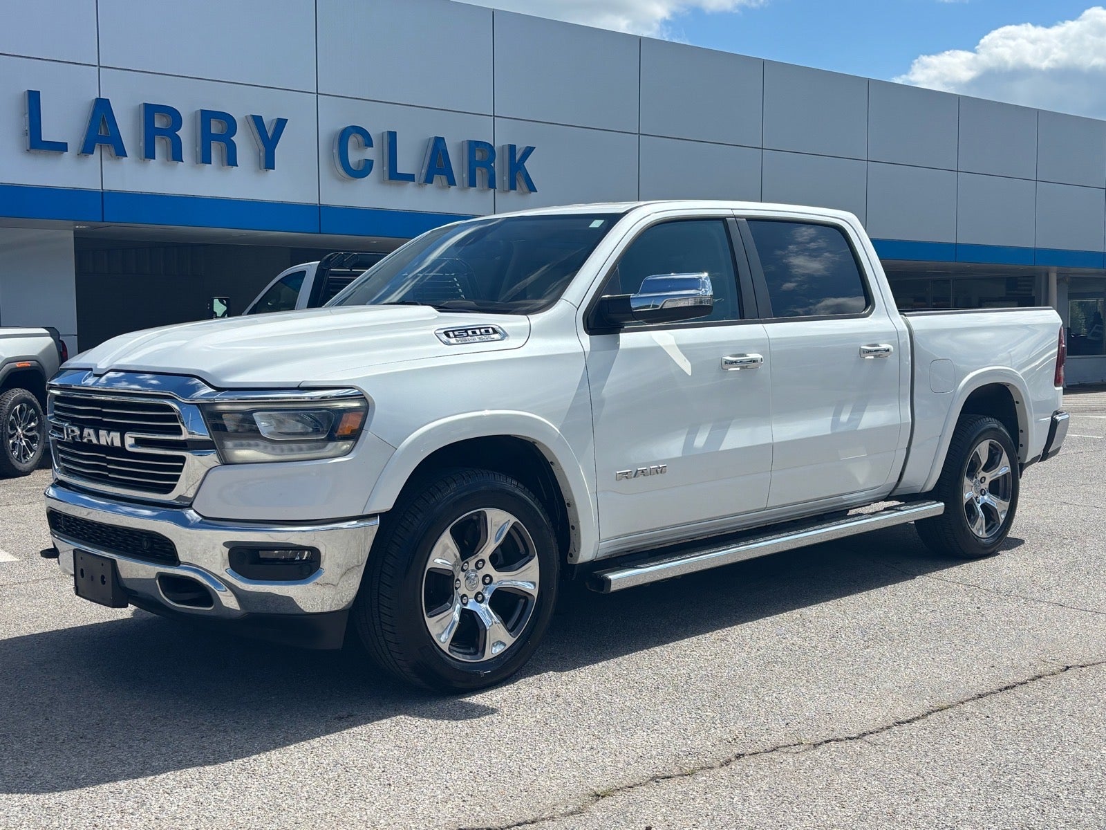 2019 RAM 1500 Laramie in White — front three-quarter view