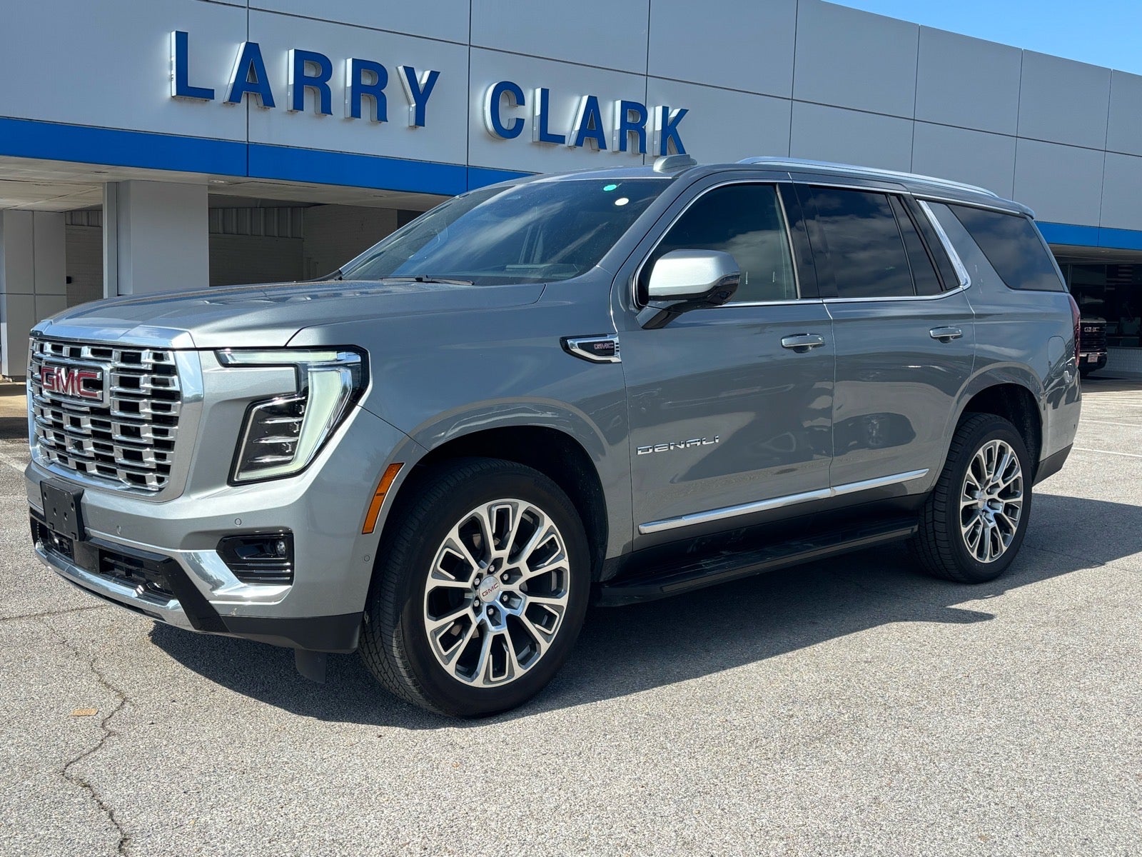 2025 GMC Yukon Denali in Sterling Metallic — front three-quarter view
