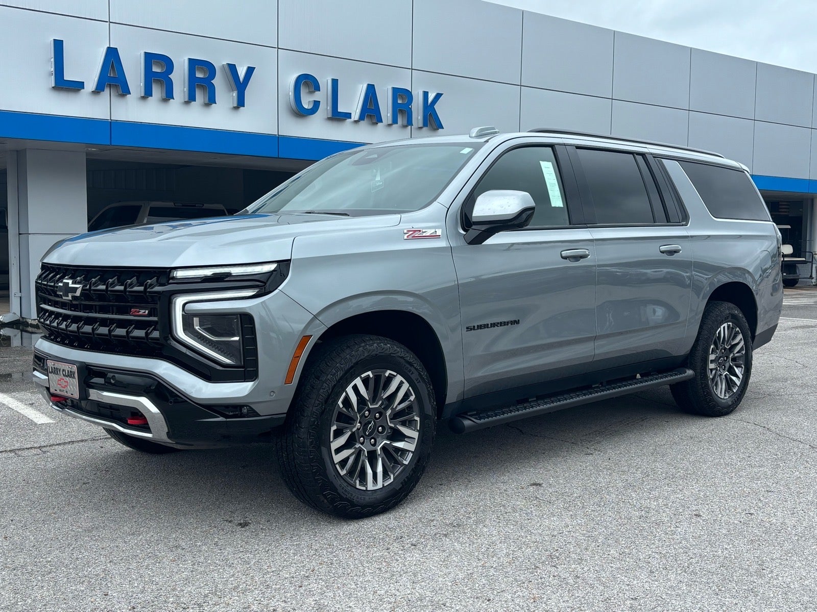 2025 Chevrolet Suburban Z71 in Sterling Gray Metallic — front three-quarter view