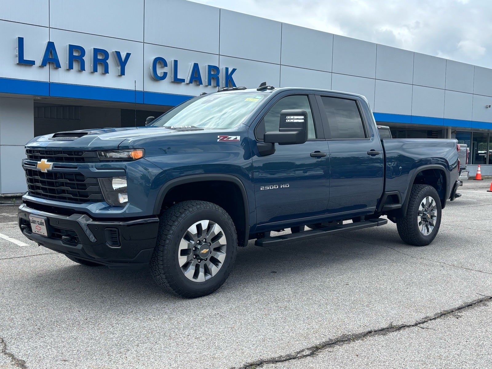 2026 Chevrolet Silverado 2500 HD Custom in Lakeshore Blue Metallic — front three-quarter view