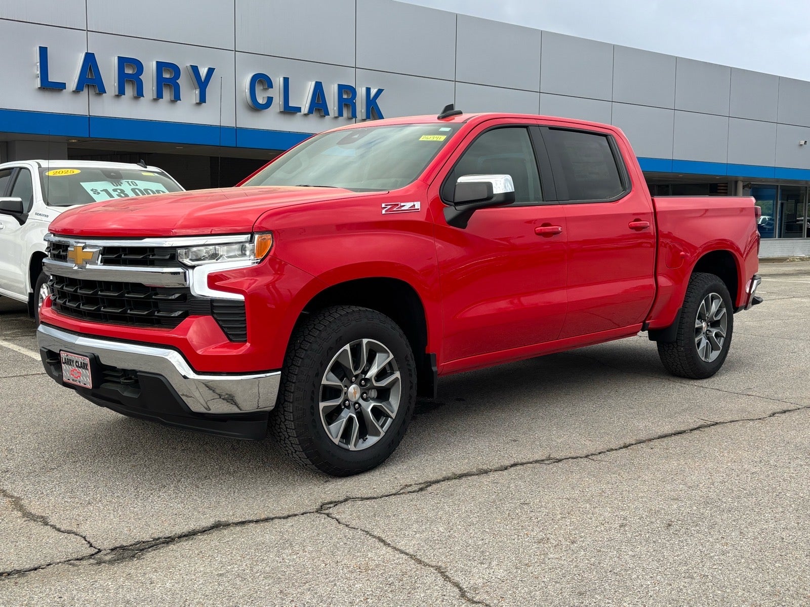 2026 Chevrolet Silverado 1500 LT in Red Hot — front three-quarter view