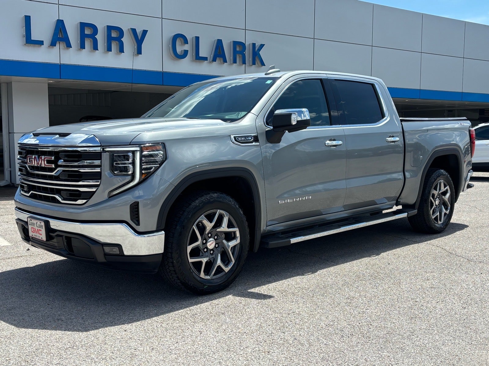 2024 GMC Sierra 1500 SLT in Sterling Metallic — front three-quarter view
